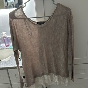 Small mauve blouse with white lace on the inside